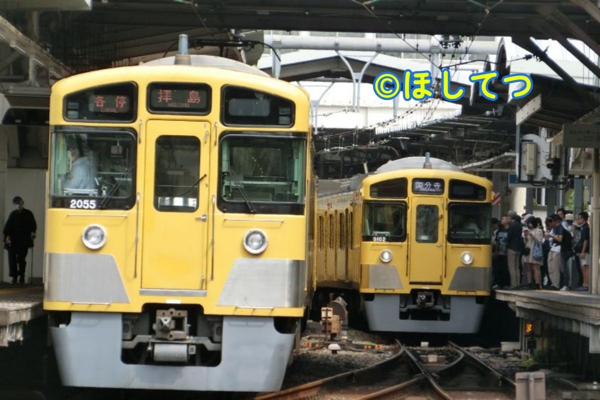 Seibu 2000 Series (left) and 9000 Series Yellow (right) side by side near Hagiyama Station