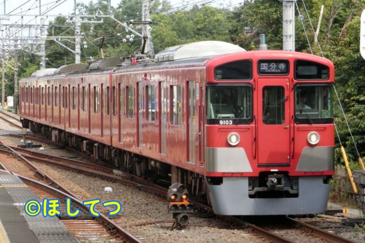 Seibu 9000 Series Red (former Red Lucky Train / Keikyu color) at Hagiyama Station on Seibu Tamako Line
