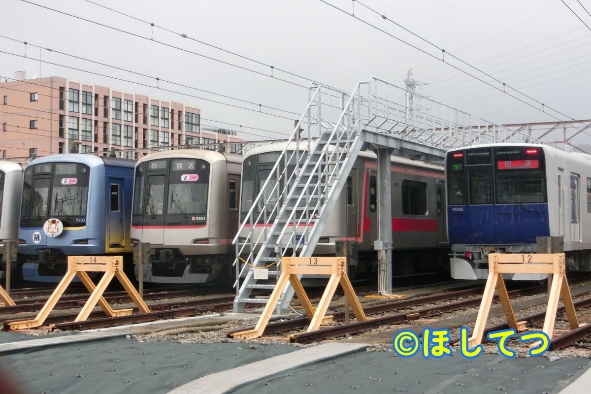 Tobu 90000 Series alongside Tokyu and Yokohama Minatomirai Railway trains at Motosumiyoshi Depot