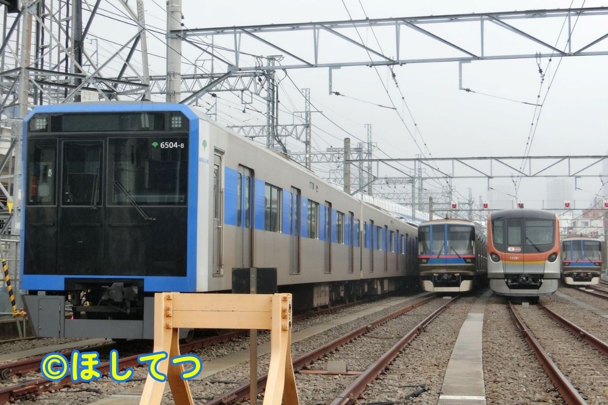 Toei Mita Line and Tokyo Metro Yurakucho Line trains at Motosumiyoshi Depot