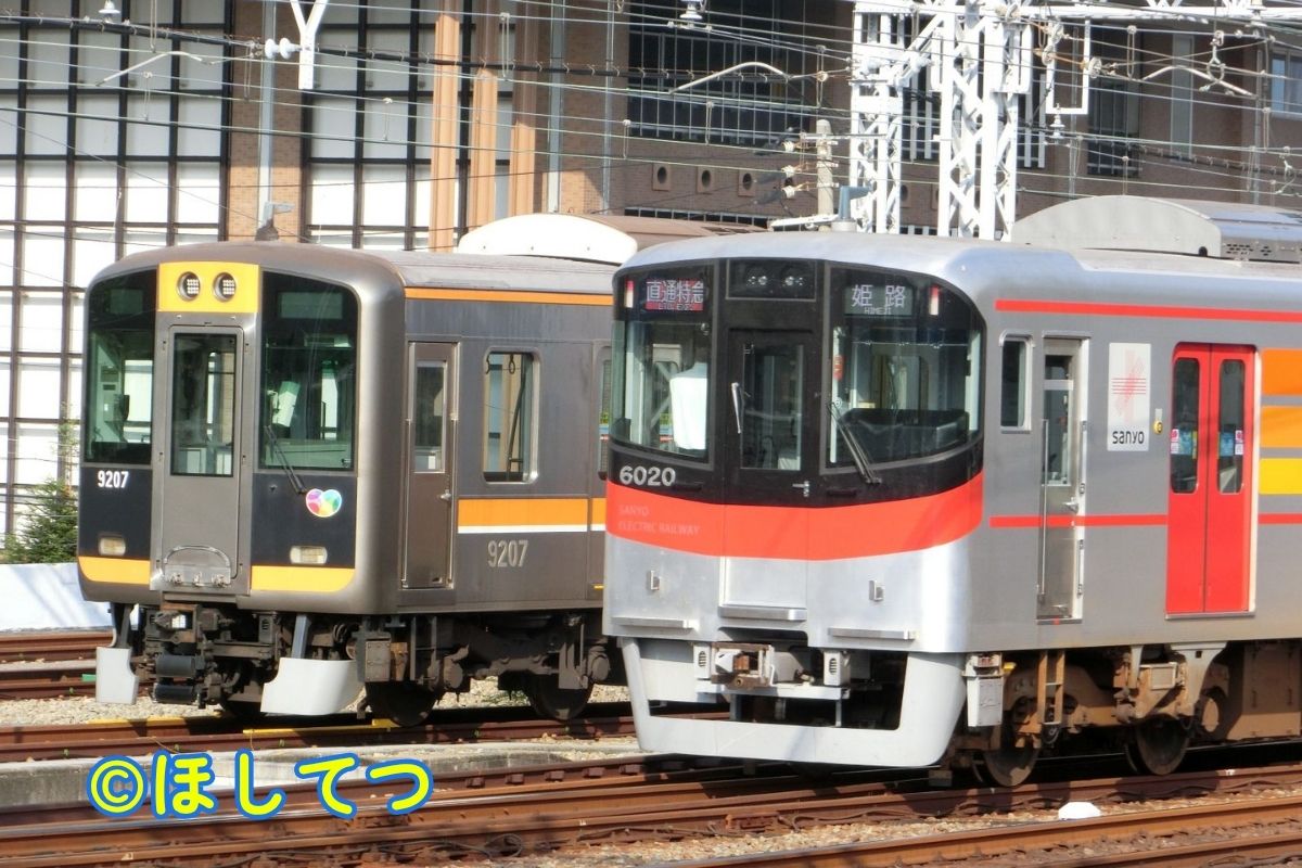 Hanshin 9000 Series and Sanyo 6000 Series side by side at Amagasaki Station
